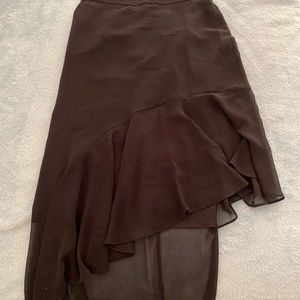 Black asymmetrical skirt.